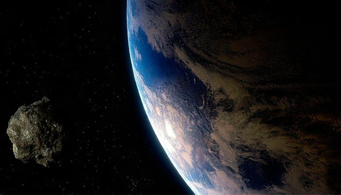 Illustrazione 3D di un asteroide in collisione con la Terra